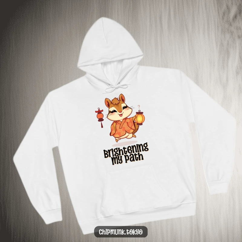 Funny hoodie featuring a chipmunk in an ornate kimono skipping with delight while holding a lantern, offering cozy joy and style.